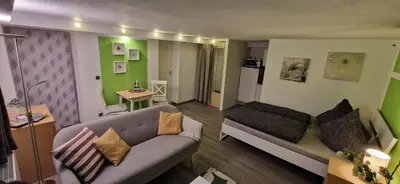 Ein Sitzbereich in der Unterkunft Ferienwohnung Bergblick