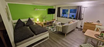 Ein Sitzbereich in der Unterkunft Ferienwohnung Bergblick