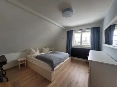 Ein Bett oder Betten in einem Zimmer der Unterkunft Hillehof Ostrau