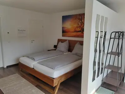 Ein Bett oder Betten in einem Zimmer der Unterkunft Ferienwohnung Elbtraum