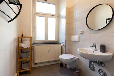 Ein Badezimmer in der Unterkunft Business & Life Apartment nähe TU, HBF und Oper - SmartTV, MagentaTV und Küche