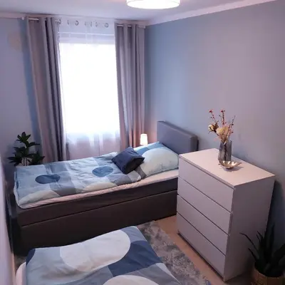 Ein Bett oder Betten in einem Zimmer der Unterkunft Apartment am Hochwald