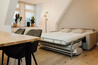 Ein Bett oder Betten in einem Zimmer der Unterkunft Bestlage im Hechtviertel & frisch saniert