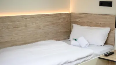 Ein Bett oder Betten in einem Zimmer der Unterkunft Roatel Schipkau (A13) my-roatel-com
