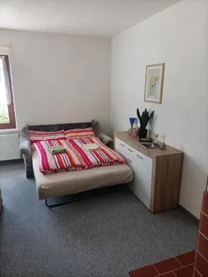 Ein Bett oder Betten in einem Zimmer der Unterkunft Lilienstein