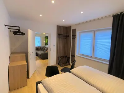 Ein Bett oder Betten in einem Zimmer der Unterkunft Luxuriöse Ferienwohnung in Chemnitz - Apartment B28 für 2 plus 2 Gäste