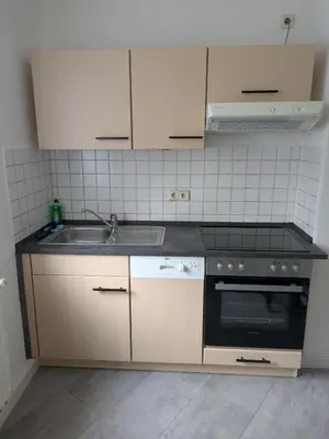 Küche/Küchenzeile in der Unterkunft Monteur Ferienwohnungen OT Kleinwaltersdorf mit Außensitzecke und Grill