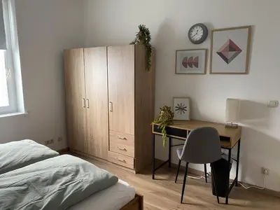 Ein Bett oder Betten in einem Zimmer der Unterkunft Apartment Pöppelmann