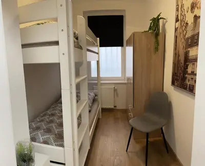 Ein Bett oder Betten in einem Zimmer der Unterkunft Apartment Pöppelmann