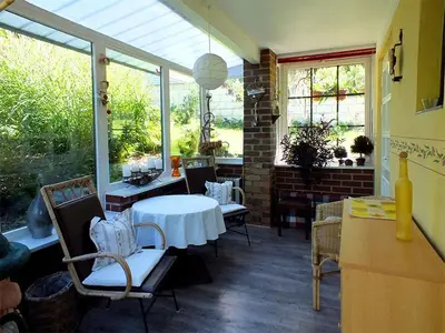 Ein Sitzbereich in der Unterkunft Ferienhaus Zum Gründel