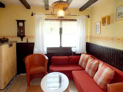 Ein Sitzbereich in der Unterkunft Ferienhaus Zum Gründel