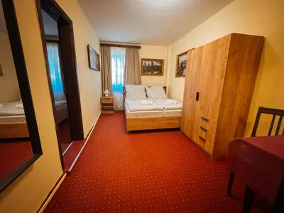 Ein Bett oder Betten in einem Zimmer der Unterkunft Pension Zum Erzgebirge