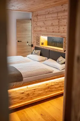 Ein Bett oder Betten in einem Zimmer der Unterkunft Zugspitze Apartement Morgen.Rot
