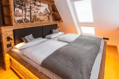 Ein Bett oder Betten in einem Zimmer der Unterkunft Zugspitze Apartment Sonn.Schein