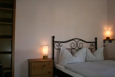 Ein Bett oder Betten in einem Zimmer der Unterkunft Schlossmühle Schieritz in der Nähe von Meißen