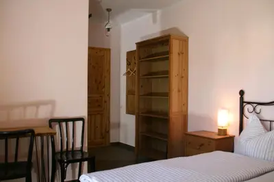Ein Bett oder Betten in einem Zimmer der Unterkunft Schlossmühle Schieritz in der Nähe von Meißen