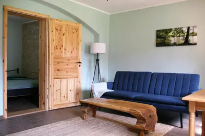 Ein Sitzbereich in der Unterkunft Schlossmühle Schieritz in der Nähe von Meißen