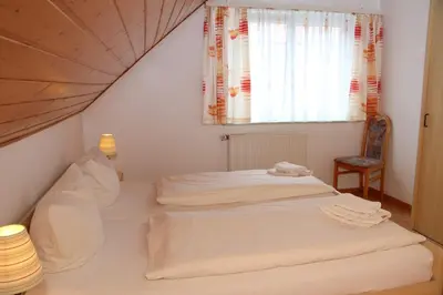 Ein Bett oder Betten in einem Zimmer der Unterkunft Ferienwohnung Elbgarten