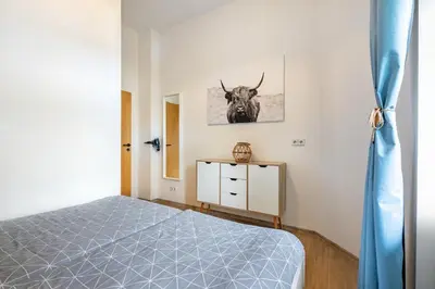 Ein Bett oder Betten in einem Zimmer der Unterkunft Zentrumsnahe Wohnung