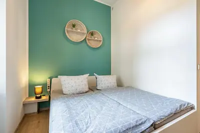 Ein Bett oder Betten in einem Zimmer der Unterkunft Zentrumsnahe Wohnung