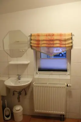 Ein Badezimmer in der Unterkunft Pension Scheers
