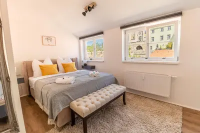 Ein Bett oder Betten in einem Zimmer der Unterkunft Daniels Apartment an der Schloßbrücke