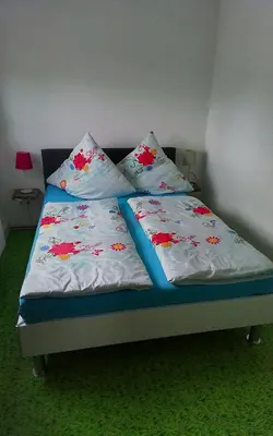 Ein Bett oder Betten in einem Zimmer der Unterkunft Landblick am Hankehübel