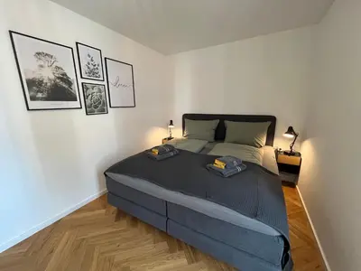 Ein Bett oder Betten in einem Zimmer der Unterkunft Wohnperle*ElbOase*einzigartig*hochwertig*ruhig