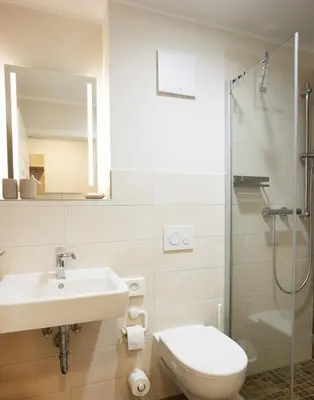 Ein Badezimmer in der Unterkunft Pension 