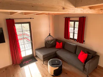Ein Sitzbereich in der Unterkunft Chalet Zugspitze