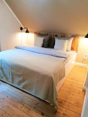 Ein Bett oder Betten in einem Zimmer der Unterkunft Haus Sandstein Glück Biedermann