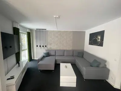 Ein Sitzbereich in der Unterkunft The Coffee Jacket Apartment
