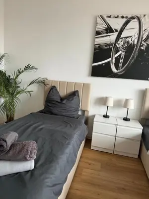 Ein Bett oder Betten in einem Zimmer der Unterkunft Monteur-& Ferienwohnung Eichmann