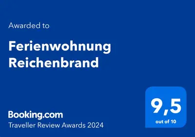 Ein Zertifikat, Auszeichnung, Logo oder anderes Dokument, das in der Unterkunft Ferienwohnung Reichenbrand mit Stellplatz ausgestellt ist