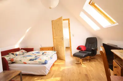 Ein Bett oder Betten in einem Zimmer der Unterkunft Stiegenstübchen am Weinberg