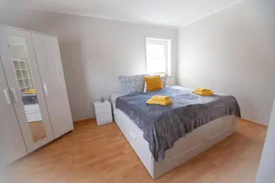 Ein Bett oder Betten in einem Zimmer der Unterkunft Stephensons Stübchen *zentrumsnah*gemütlich*